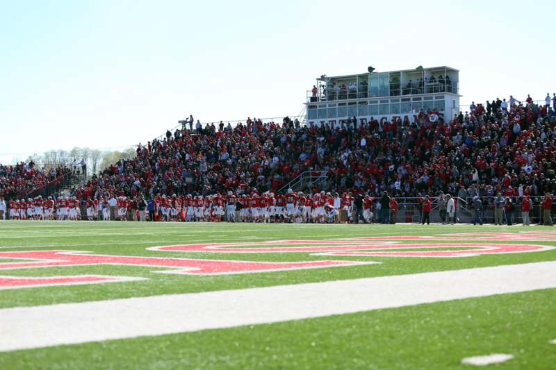 a crowd of people on a football field