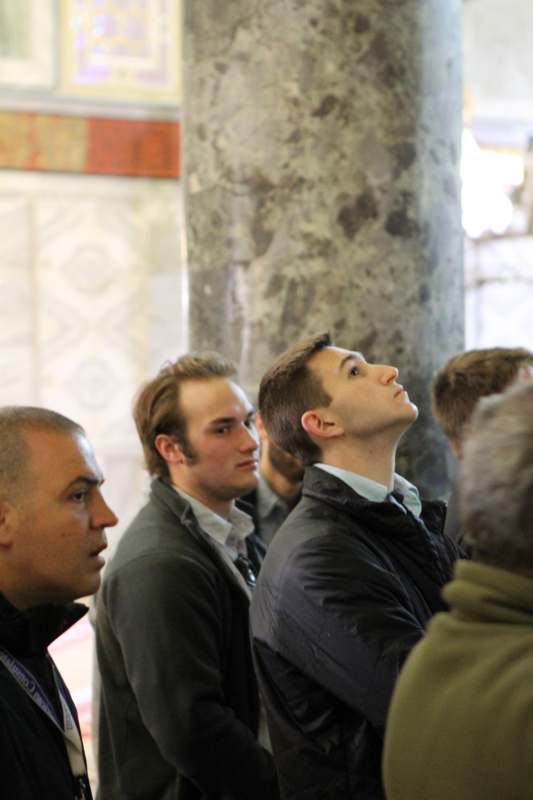 a group of men looking up