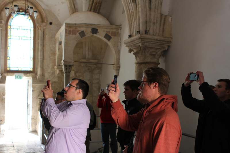 a group of men taking a picture of themselves