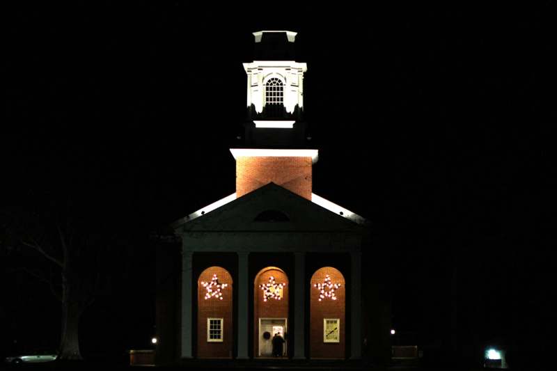 a building with a bell tower and a star shaped window