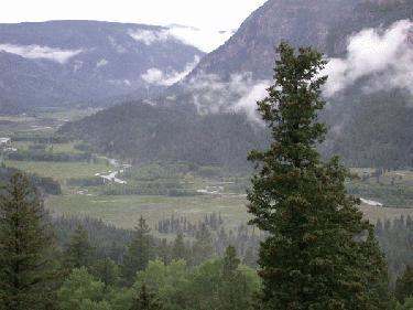 a view of a valley and mountains