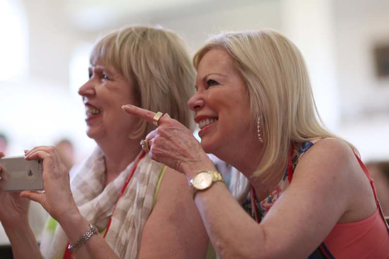a couple of women laughing