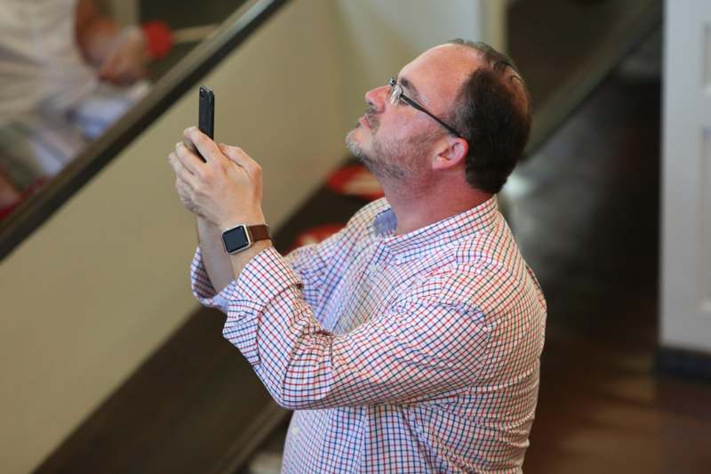 a man holding a phone