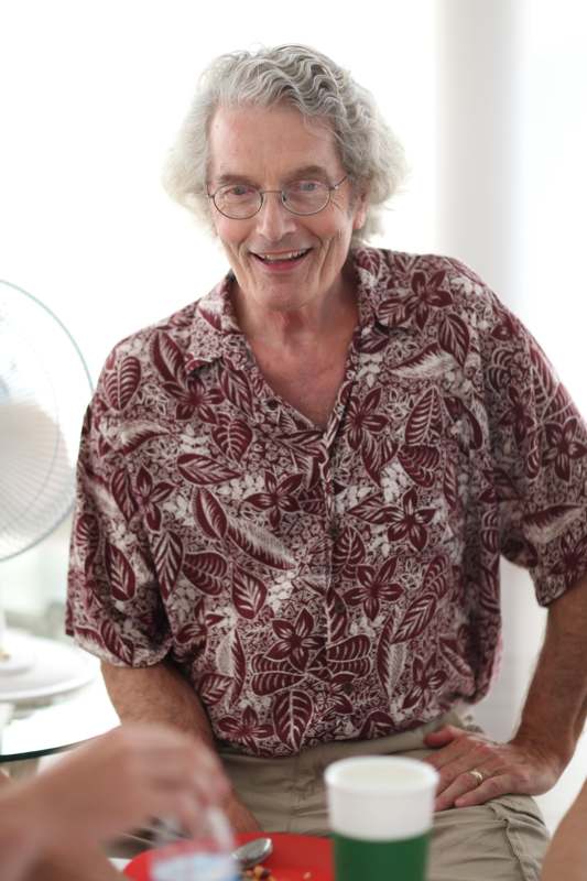 a man in a floral shirt