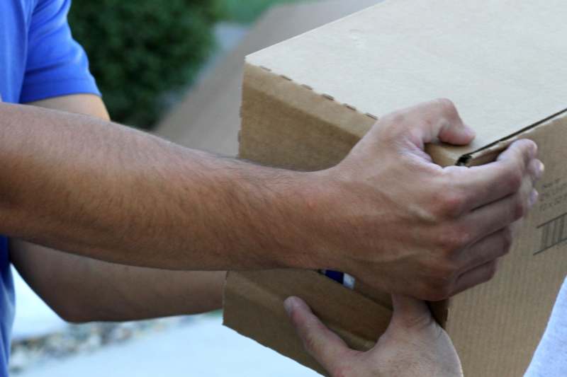 a person holding a box