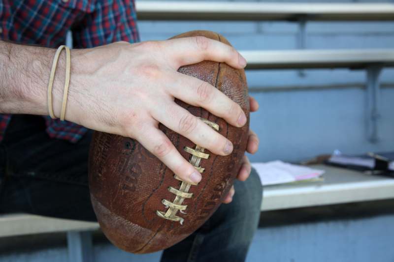 a man holding a football