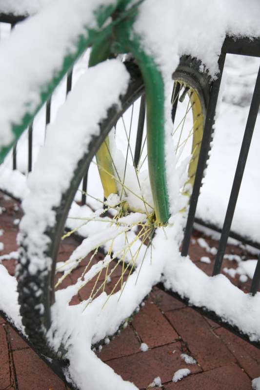 a bicycle tire covered in snow