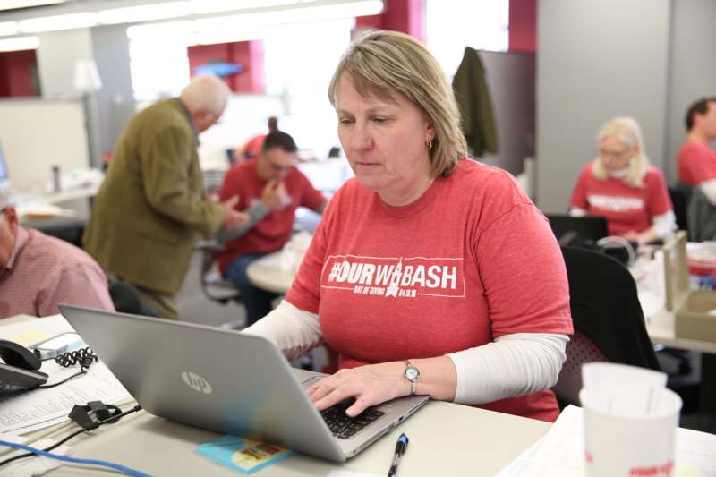 a woman using a laptop