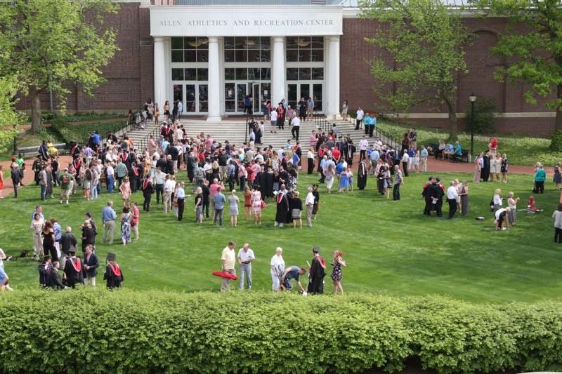 a large group of people outside of a building