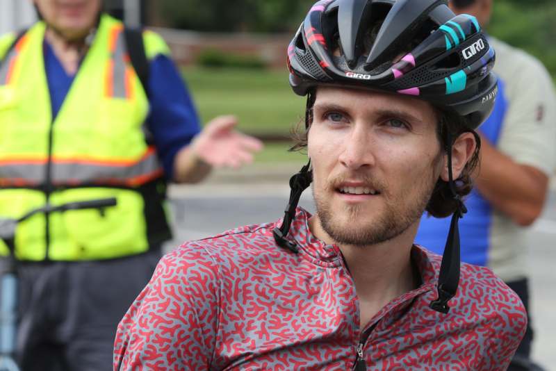 a man wearing a bicycle helmet