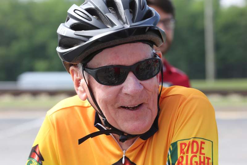 a man wearing a helmet and sunglasses