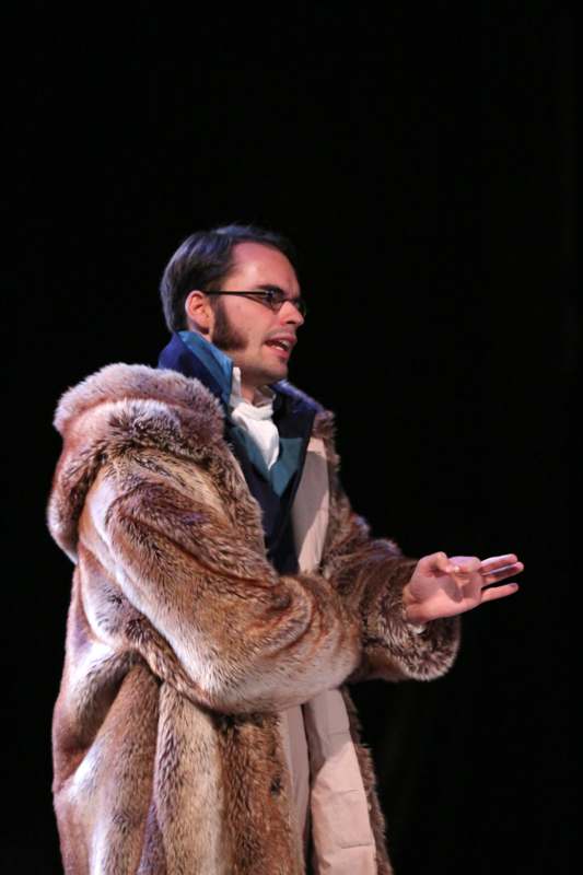 a man in a fur coat