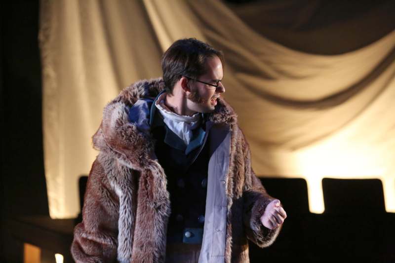 a man in a fur coat