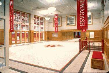 a large hall with red banners