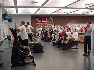a group of people in a gym