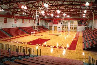 a basketball court with red and white text