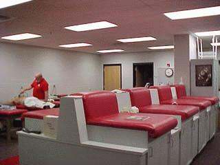 a room with red couches