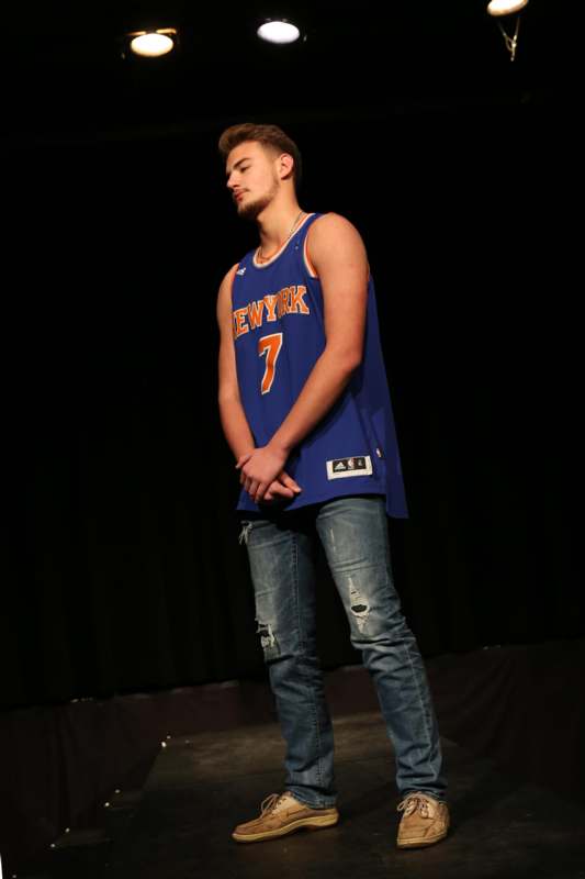 a man in a basketball jersey
