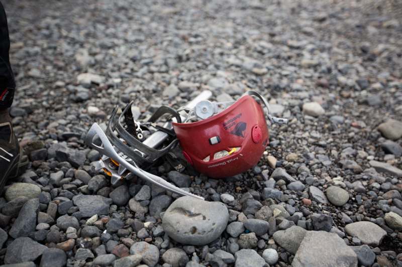 a broken helmet on rocks