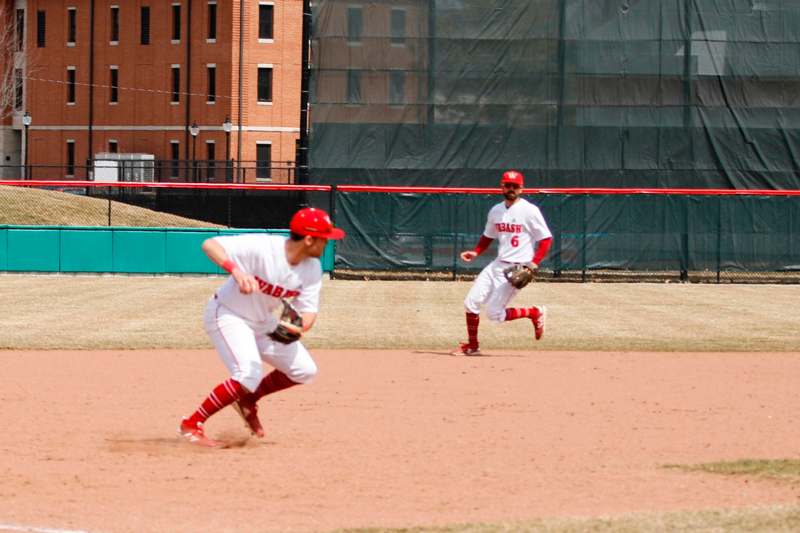a baseball players running on a field