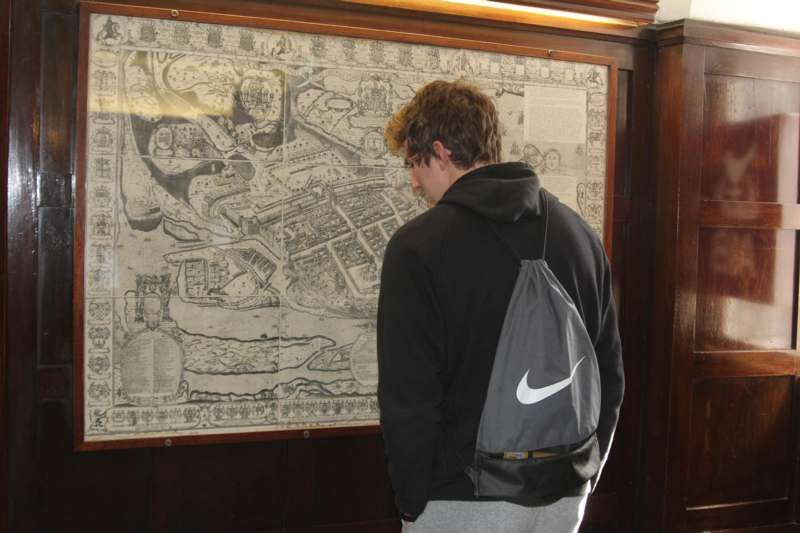 a man looking at a map