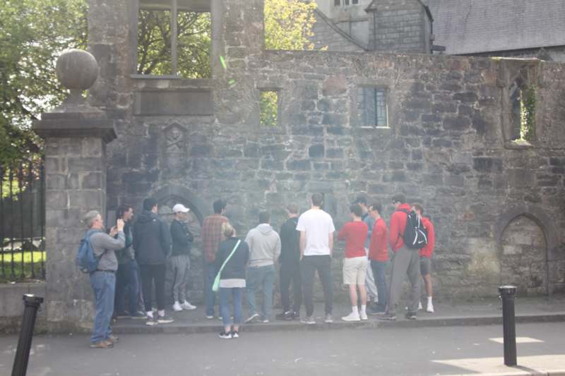 a group of people standing in a line