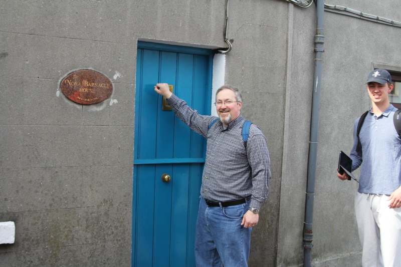 a man holding a door knob