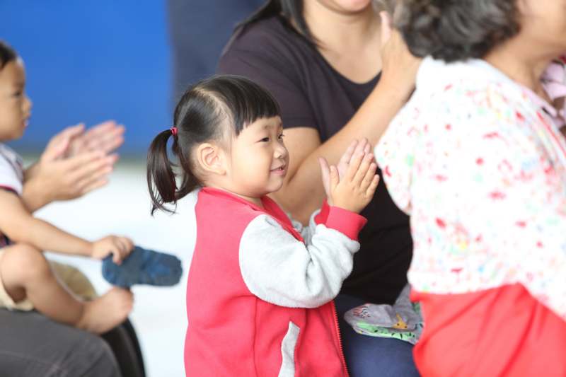 a girl clapping her hands
