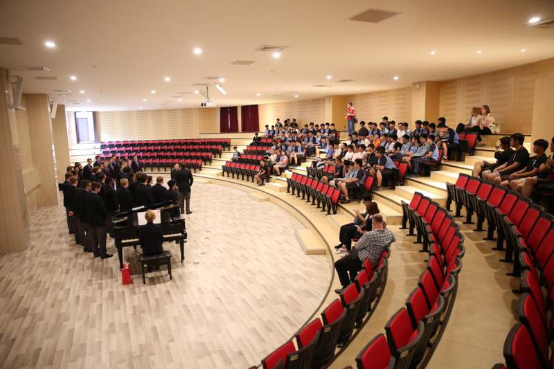 a group of people in a auditorium