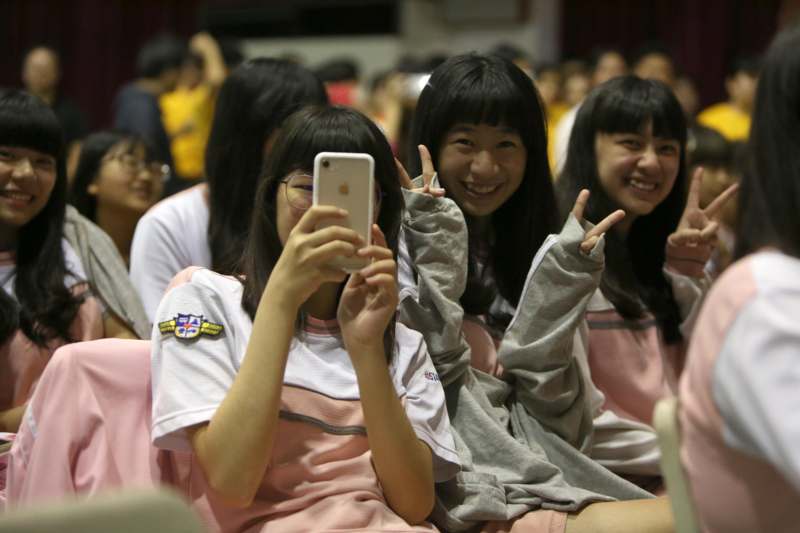 a group of girls taking a selfie