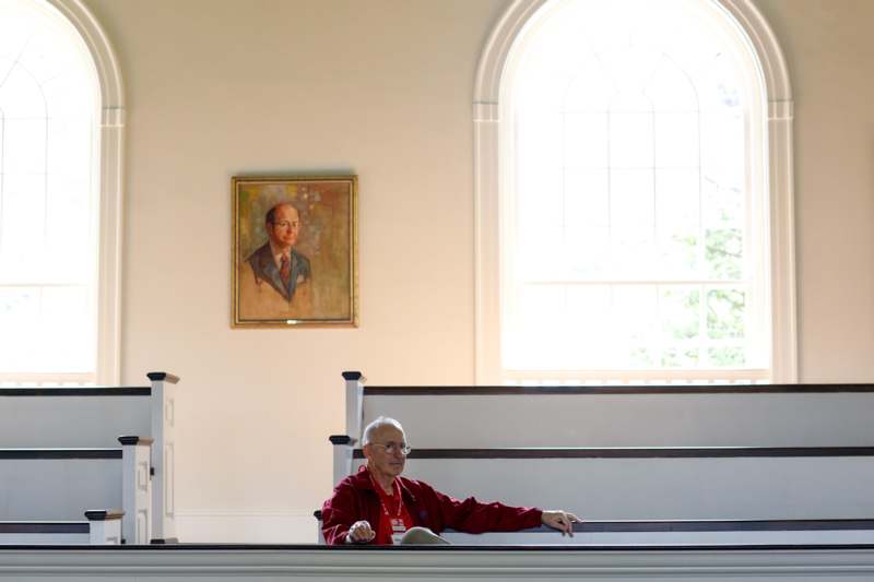 a man sitting in a church