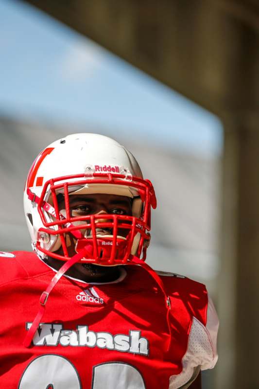 a football player wearing a helmet