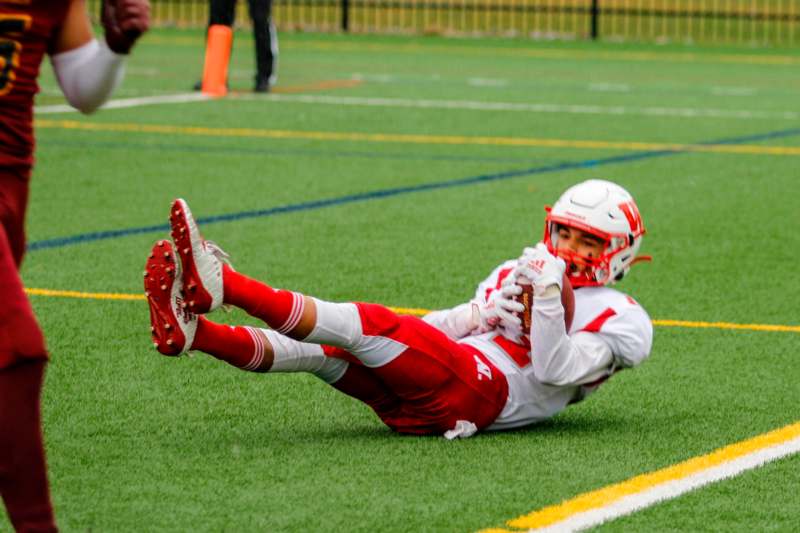 a football player lying on the ground