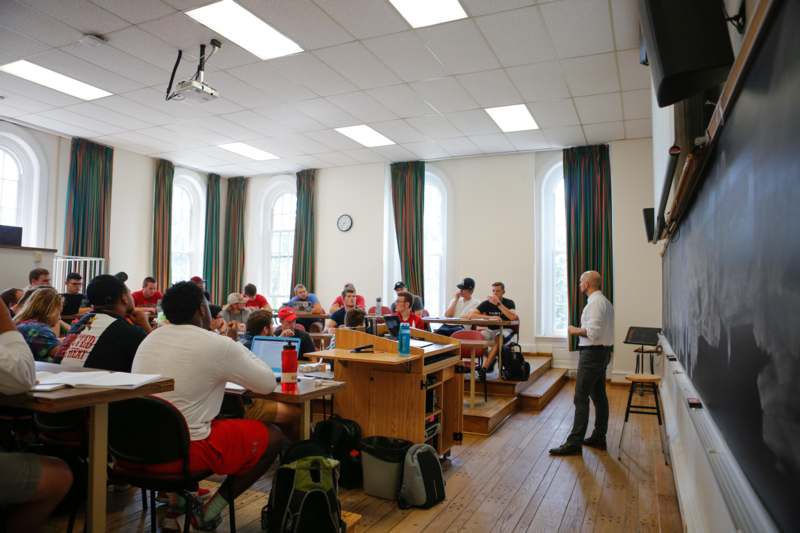 a group of people in a classroom