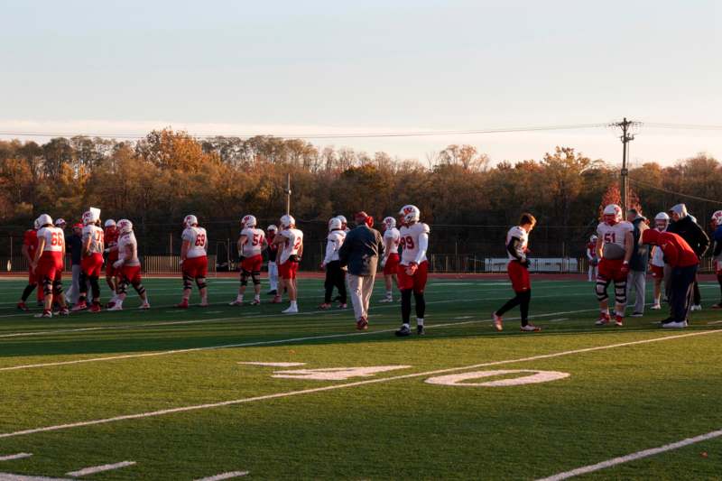 a group of people on a football field