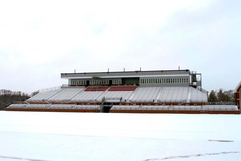 a stadium with snow on the ground