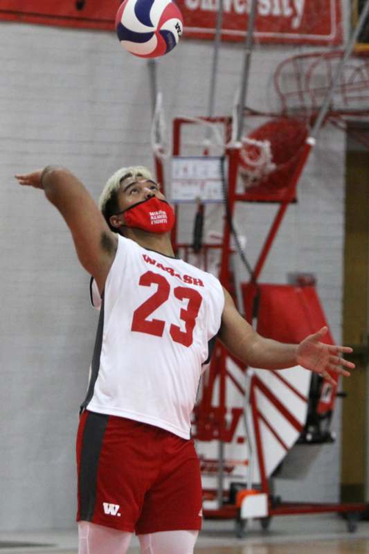 a man wearing a mask and a jersey