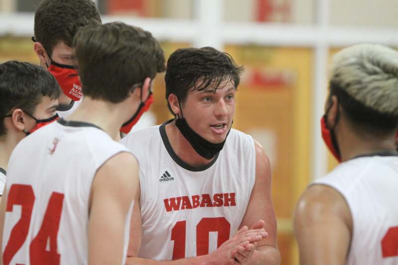 a group of men in a basketball game