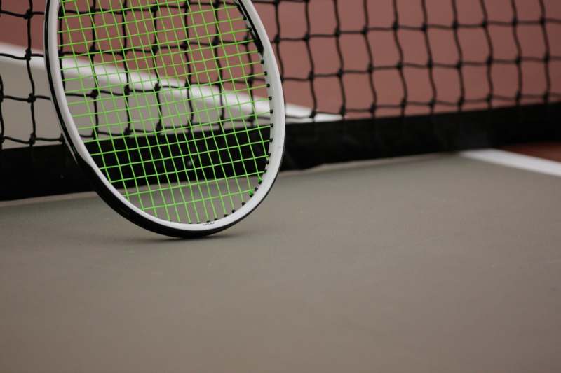 a tennis racket on a tennis court