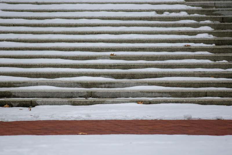 a set of stairs with snow on them