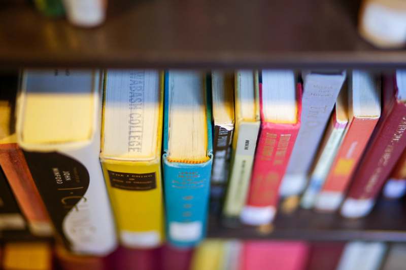 a close up of books on a shelf