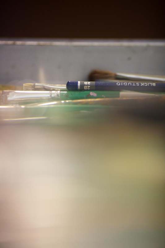 a close up of paint brushes