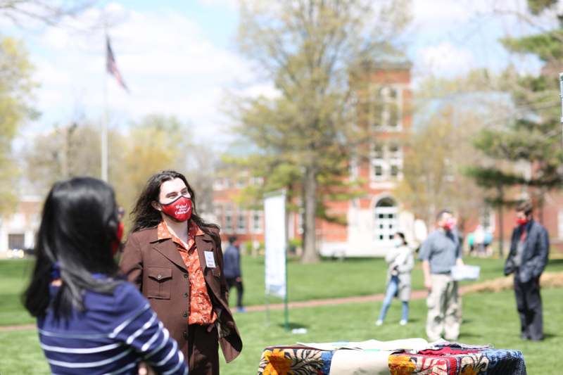 a woman wearing a face mask outside