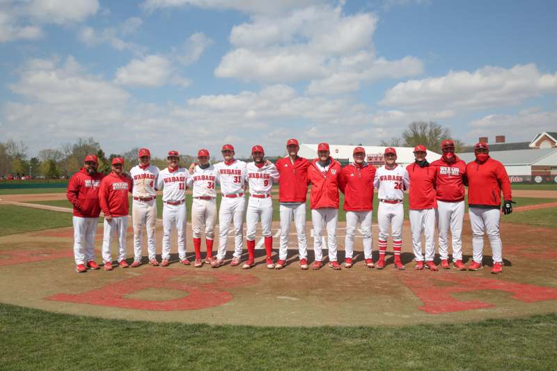 a group of baseball players posing for a photo