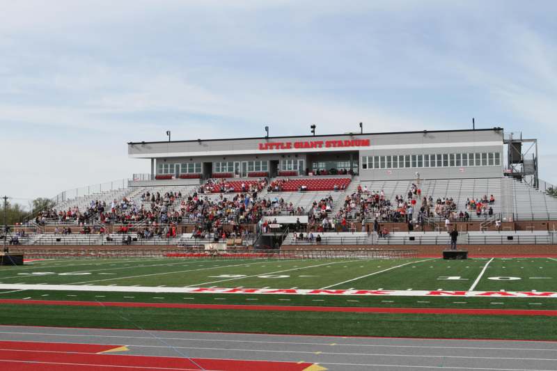 a stadium with people in the stands