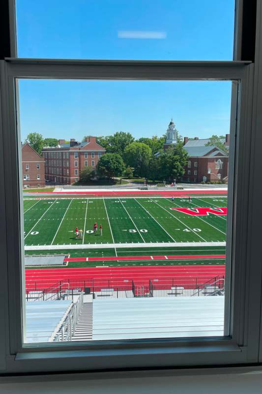 a view of a football field from a window