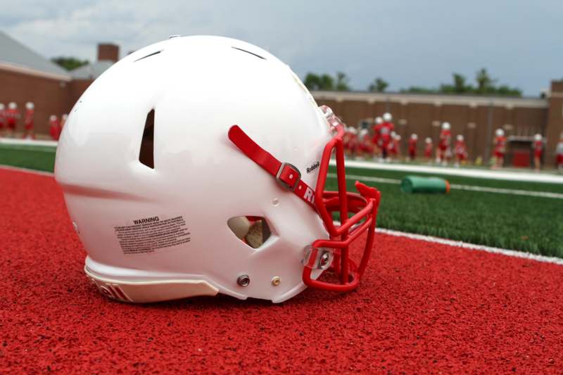 a white football helmet on a field