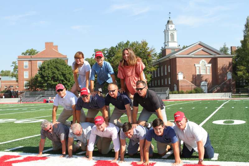 a group of people on a football field