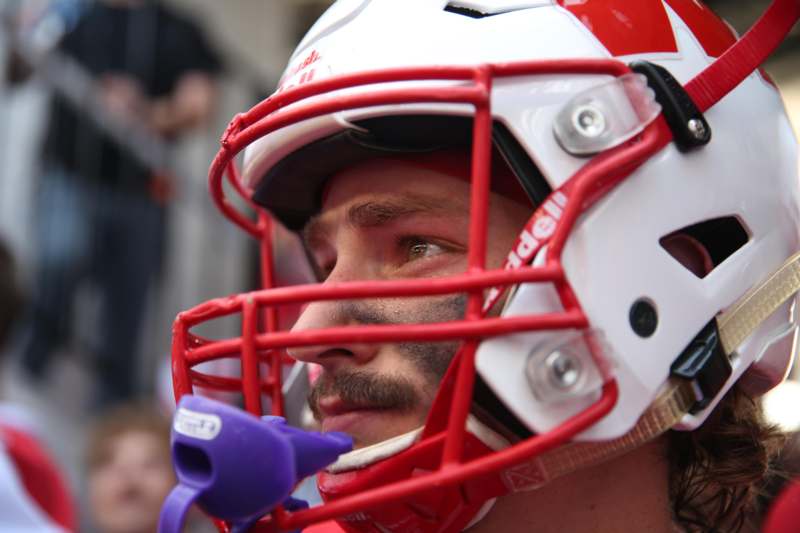 a man wearing a football helmet