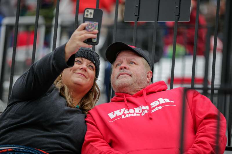 a man and woman taking a selfie